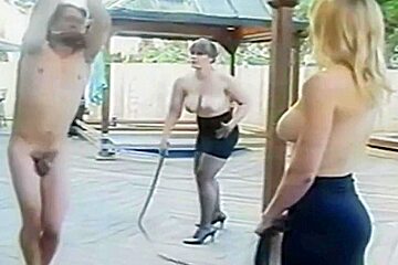 Two Dommes Whip Tied Man