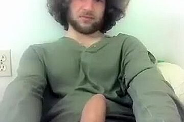 Attractive Male Is Playing In The Apartment And Shooting Himself On Computer Webcam