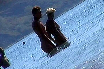 Naked Chicks Swimming In The Sea On A Nudist Beach