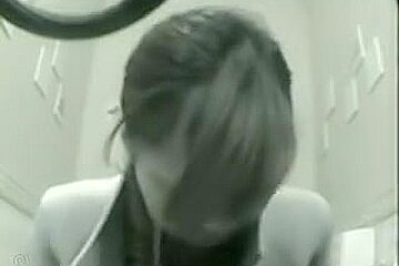 Girl Peeing On Cam Is Getting In The Toilet
