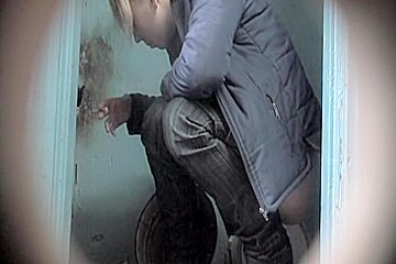 Pretty Blonde Is Smoking And Pissing On The Toilet