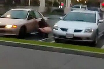 Security Cam Shoots Amateur Pissing Between Two Cars