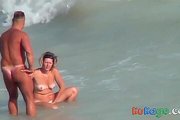. Guy With Tanned Ass Fuck A Woman At A Public Beach