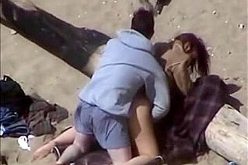 Non Professional Pair Think They Are Alone On The Beach