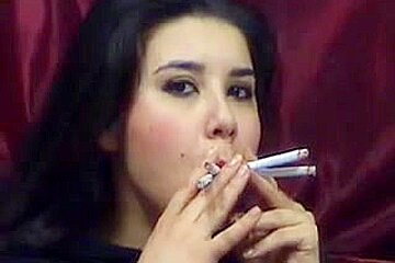 Hottie Smokes Multiple Cigarettes